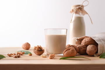 Glass of alternative vegetable drink of walnuts isolated background