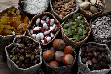 shop counter with a selection of nuts and cereals in vintage bags