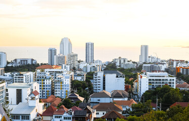 Panoramic view of buildings and streets at sunset in Pattaya, Thailand
