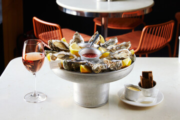 Opened Oysters dark bread with butter and wine