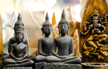 Buddha statue figures souvenir on display for sale on street market