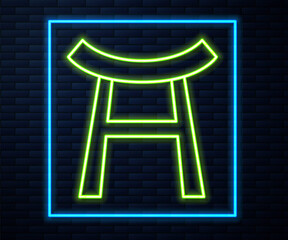 Glowing neon line Japan Gate icon isolated on brick wall background. Torii gate sign. Japanese traditional classic gate symbol. Vector