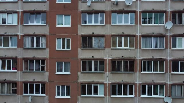 A drone rises near a scary depressive Soviet-style residential building.
Chernobyl style old building. Balconies of a panel building in the ghetto. Panel apartments. Third World country. 