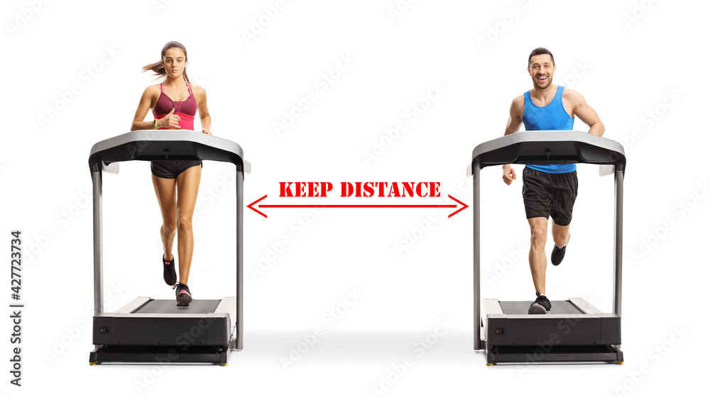 Poster Young man and woman exercising on treadmills with sign keep distance between them