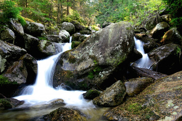 Mountain stream and waterfall in The High Tatras National Park in Slovakia