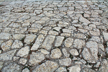 Stone background texture of the floor of the theater of The Palace of Knossos on Crete in Greece near Heraklion is called Europe’s oldest city and the ceremonial and political center of the Minoan civ