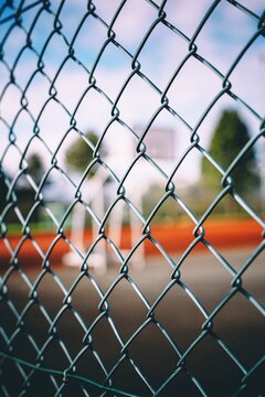 Full Frame Shot Of Soccer Field Seen Through Chainlink Fence