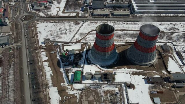 smoke stacks exhaust pipes. Thermal power plant pipes. Air pollution, smokestack exhaust gases. Industry zone, thick smoke plumes. Climate change, ecology.