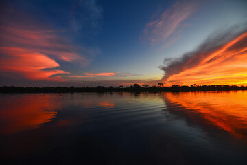 Obraz premium Beautiful sunset on the Guaporé-Itenez river, Ricardo Franco, Vale do Guaporé Indigenous Land, Rondônia, Brazil
