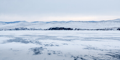 Snow hills on the shore of Lake Baikal