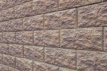 abstract background of painted brown stone lined wall perspective view