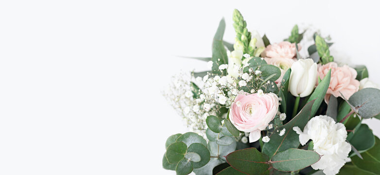 Spring flower bouquet over light background with copy space. Bridal bouquet, online blog header
