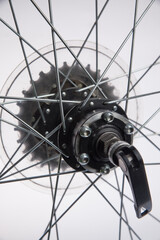 Bicicle repair or maintenance. Removal of rear disc brake caliper, in attempt to change rear brake pads on a mountain bicycle.
