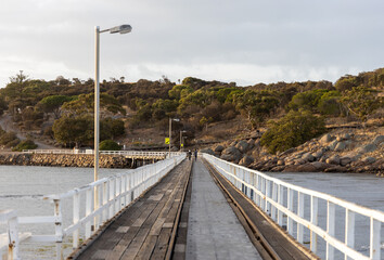 Fototapeta premium the causeway at the granite island end in Victor Harbor south australia on April 12th 2021