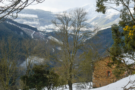 View of the snow-capped Mount Kolitza over the Artzentales valley