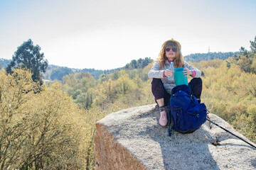 woman drinking practicing sport hiking