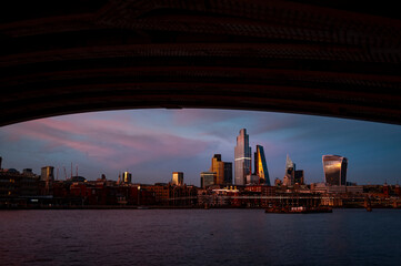 Early Evening Skyline view over London's Financial District from South of the River Thames, London, England