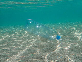 Plastic bottle pollution in ocean, Plastic pollution in ocean, Plastic bottle in the ocean sea water, Plastic water bottles pollution in ocean (Environment concept), underwater bottle plastic.