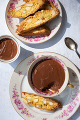 Italian cantuccini biscuits and dark chocolate pot