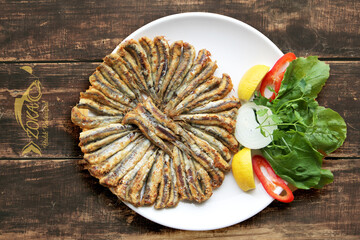 stir-fried anchovies, appetizer on the table