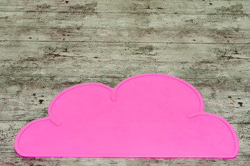 table ready with pink cloud tablecloth for a baby while eating with blw or baby led weaning method