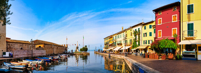 Lazise, Italy, 10/25/2019 : View of Lazise at the lakeside of Lake Garda in summer in the northern...