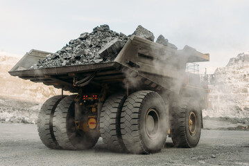 Komatsu 730e dump truck at a gold mining site.
