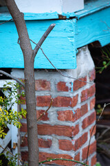 Bright blue painted wood with flowers and leaves