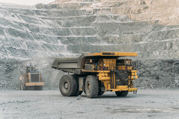 Komatsu 730e dump truck at a gold mining site.