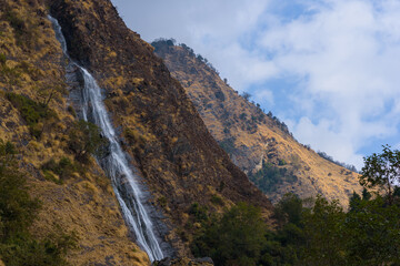 Fototapeta na wymiar Scenic View Of Waterfall Against Sky