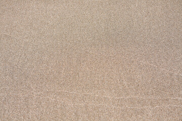 Naklejka na ściany i meble 渚の砂浜に残る波の紋 
