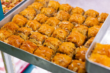 Popular Turkish Baklava dessert with delicious fillings on the market in Turkey...