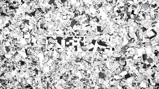 the word NEWS being covered in cut-up newspaper stop motion loop monochrome 
