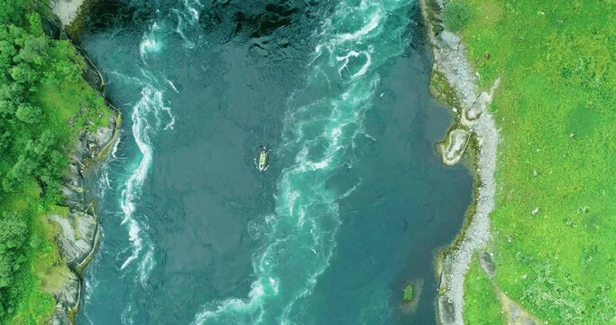 Aerial top down view of tourist rib drifting in Saltstraumen maelstrom