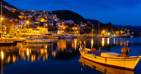 Fototapeta na wymiar Kas Harbour at night as viewed from the sea, Lycian Coast, Turkey