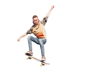 Young man jumping a skateboard on a white background.