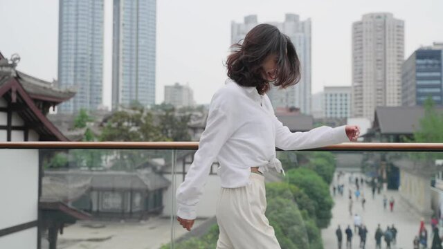 4k Slow Motion Side View Lovely Young Asian Woman In White Shirt Walking In The Urban City Street At Chengdu China Young People Travel In The City