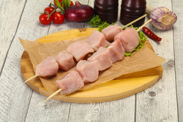 Raw pork meat skewer for grill