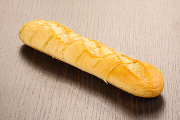 Crust tasty baguette over board