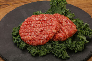 Raw beef burger cutlet for cooking