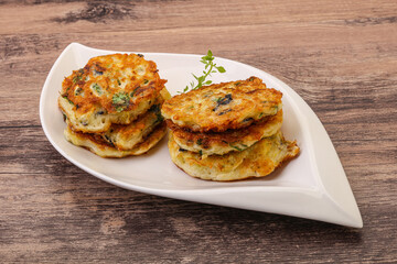 Zucchini pancakes with herbs and spices