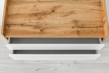 Modern chest of drawers in room, closeup