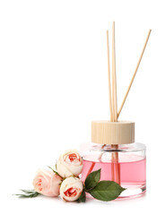 Reed diffuser with roses on white background