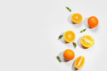Fresh oranges on white background