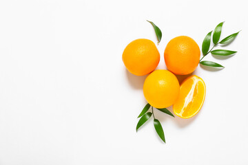 Fresh oranges on white background