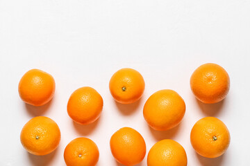 Fresh oranges on white background