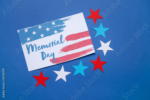 Greeting card for Memorial Day celebration on color background