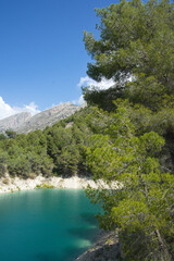 Fototapeta na wymiar An idyllic lake between mountains.Guadalest reservoir in Alicante, Spain.