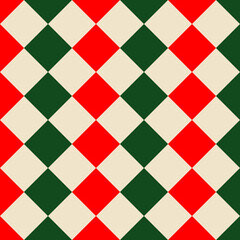 Argyle seamless Christmas pattern - made of repeat red, green, and beige diamonds. Made in the traditional Scandinavian style of hand drawing. Used as a print for fabric, wrapping paper.