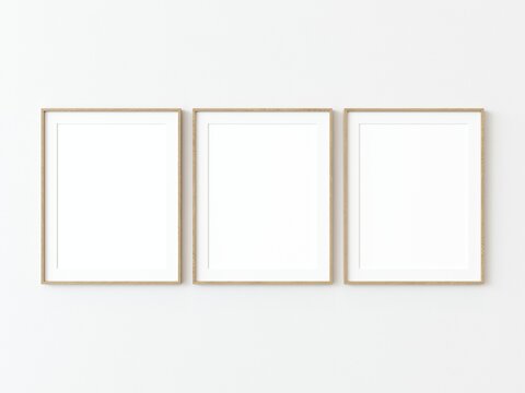 Three light wood thin rectangular vertical frame hanging on a white textured wall mockup, Flat lay, top view, 3D illustration